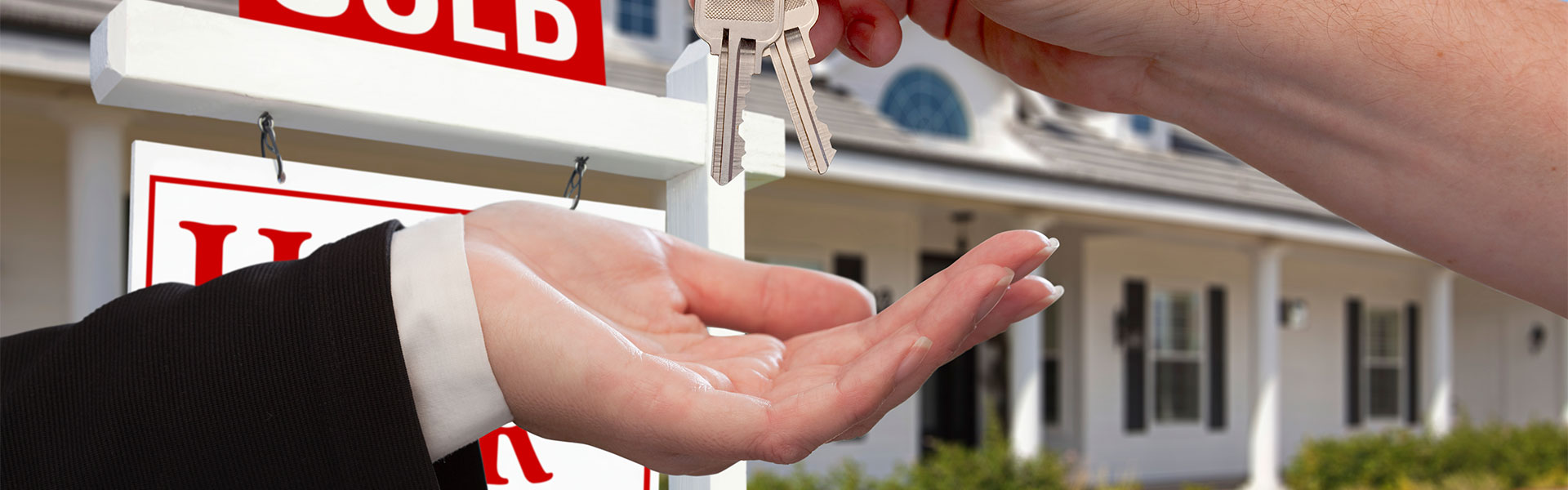 Hand over keys to sold house