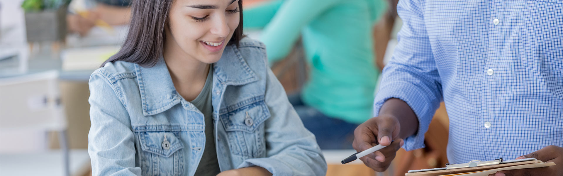 Girl getting help from tutor